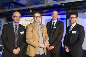 David Gutfreund of LSE Retail Group (second left) receives the award for Fastest Growing Medium-Sized Business from (left to right) Paul O'Halloran of MEN Media, Paul Johnson of Ward Hadaway and Brad Miller of Manchester Airport.