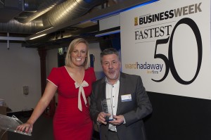 Ian Guest, managing director of Assist Facilities Management, with awards presenter Steph McGovern.