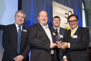 Hi-tech success – Craig Such, MD of Azzure IT (second from left) accepts the award for fastest growing small business with (from left) Philip Jordan of Ward Hadaway, Greg Wright of The Yorkshire Post and guest speaker Larry Gould, CEO of thebigword.