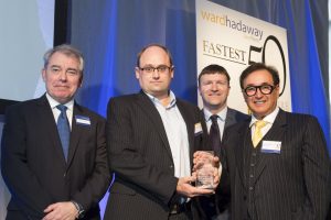 Glenn Harding, CEO of headoffice3, with the award for fastest growing medium business alongside (from left) ) Philip Jordan of Ward Hadaway, Greg Wright of The Yorkshire Post and guest speaker Larry Gould, CEO of thebigword.