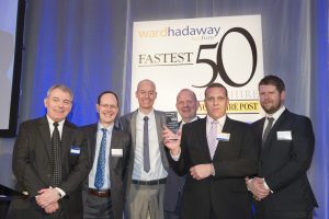 Advanced Forwarding receive the award for Fastest Growing Medium Sized Business - from left are Philip Jordan of Ward Hadaway; John Cridland of Transport for the North; Nick Kay, Ben Balfour and Rory Watts of Advanced Forwarding and Yorkshire Post editor James Mitchinson.