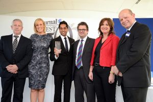 Taking care - (from left) the team from Careline Lifestyles accept their award from Steph McGovern (second left) and Colin Hewitt (right of picture)