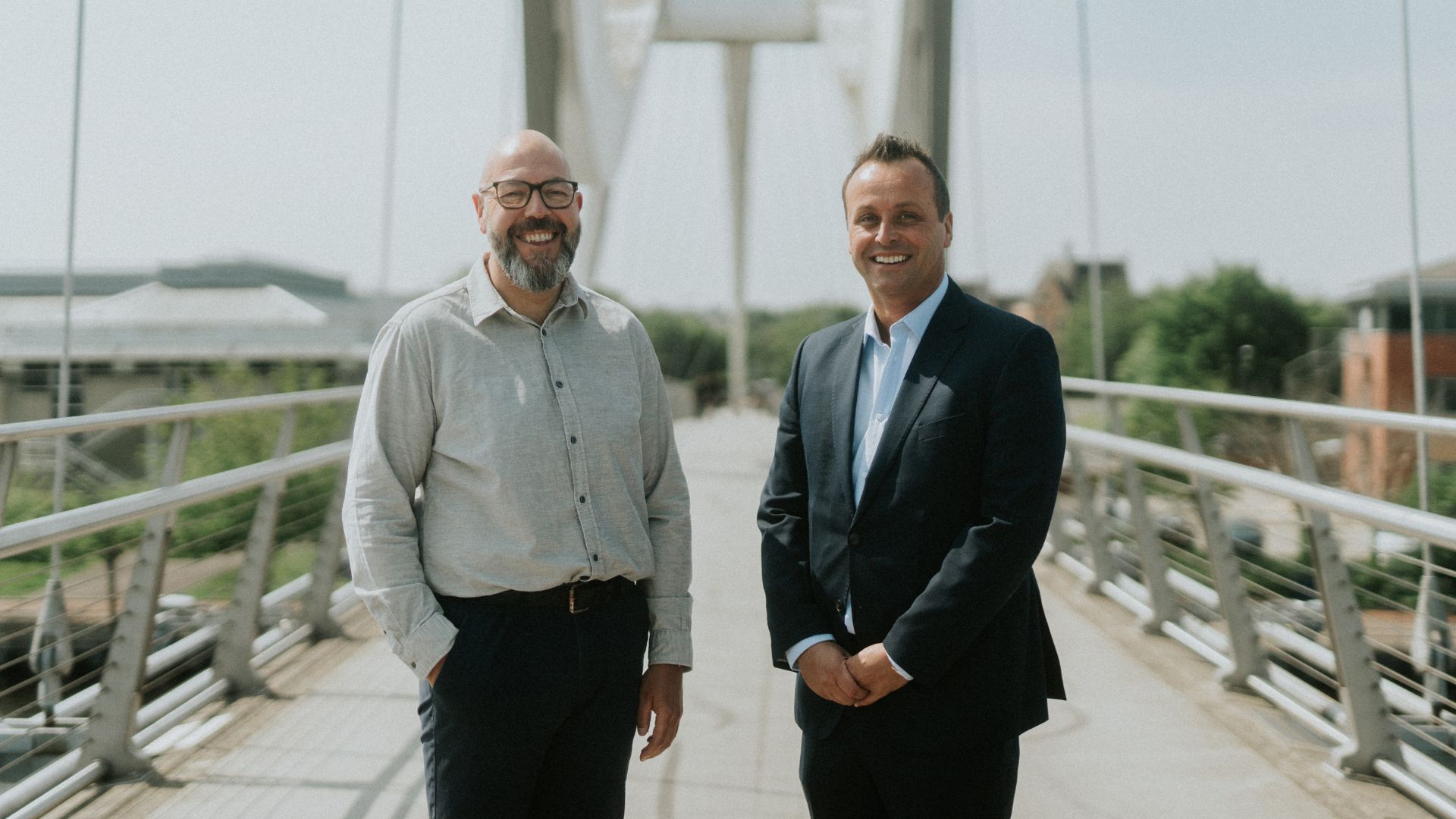 Steve-Petrie-and-Lee-Bramley stood on Infinity Bridge in Stockton-on-Tees