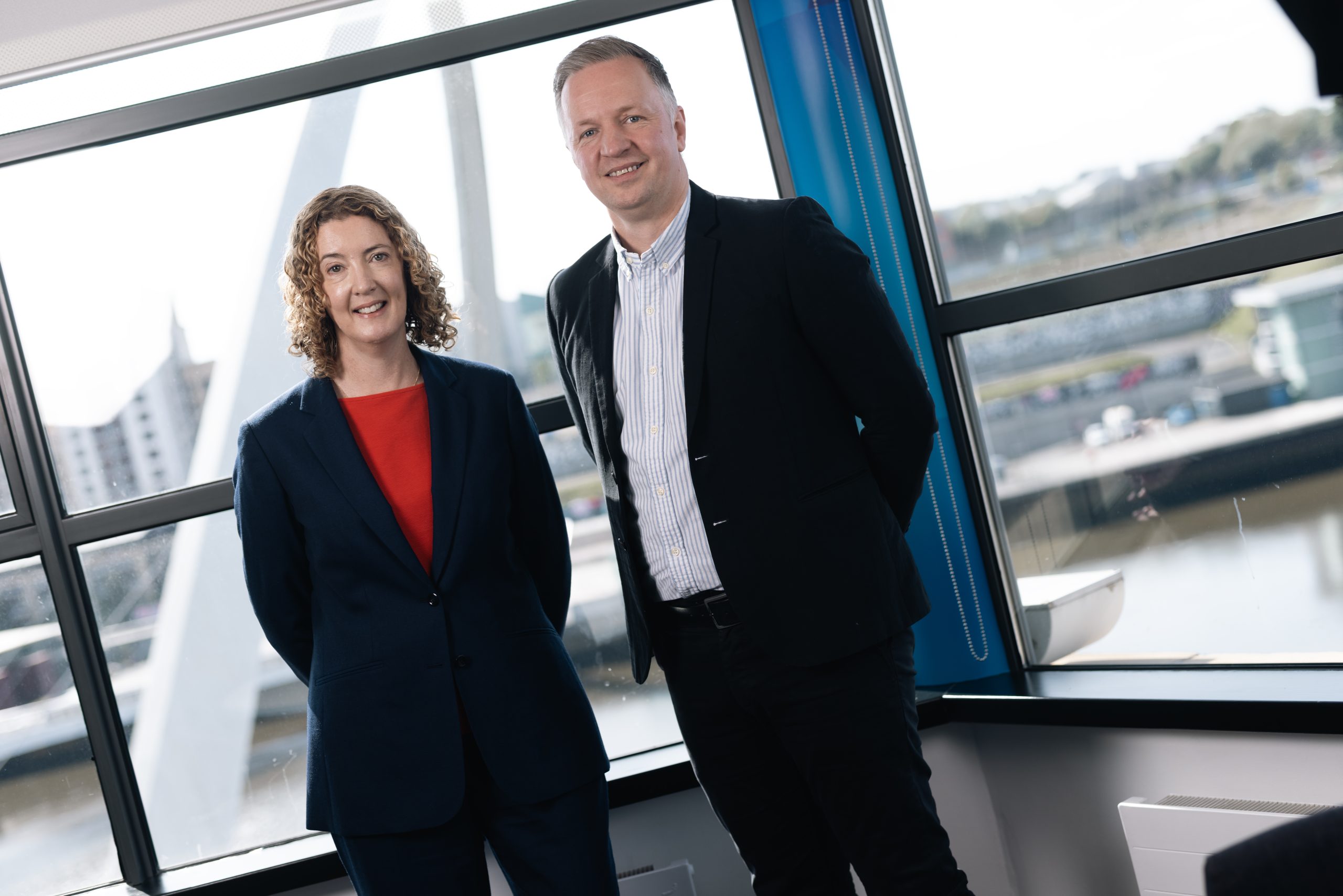 Nicola Williams stood with Nik Tunley in Ward Hadaway's Newcastle office