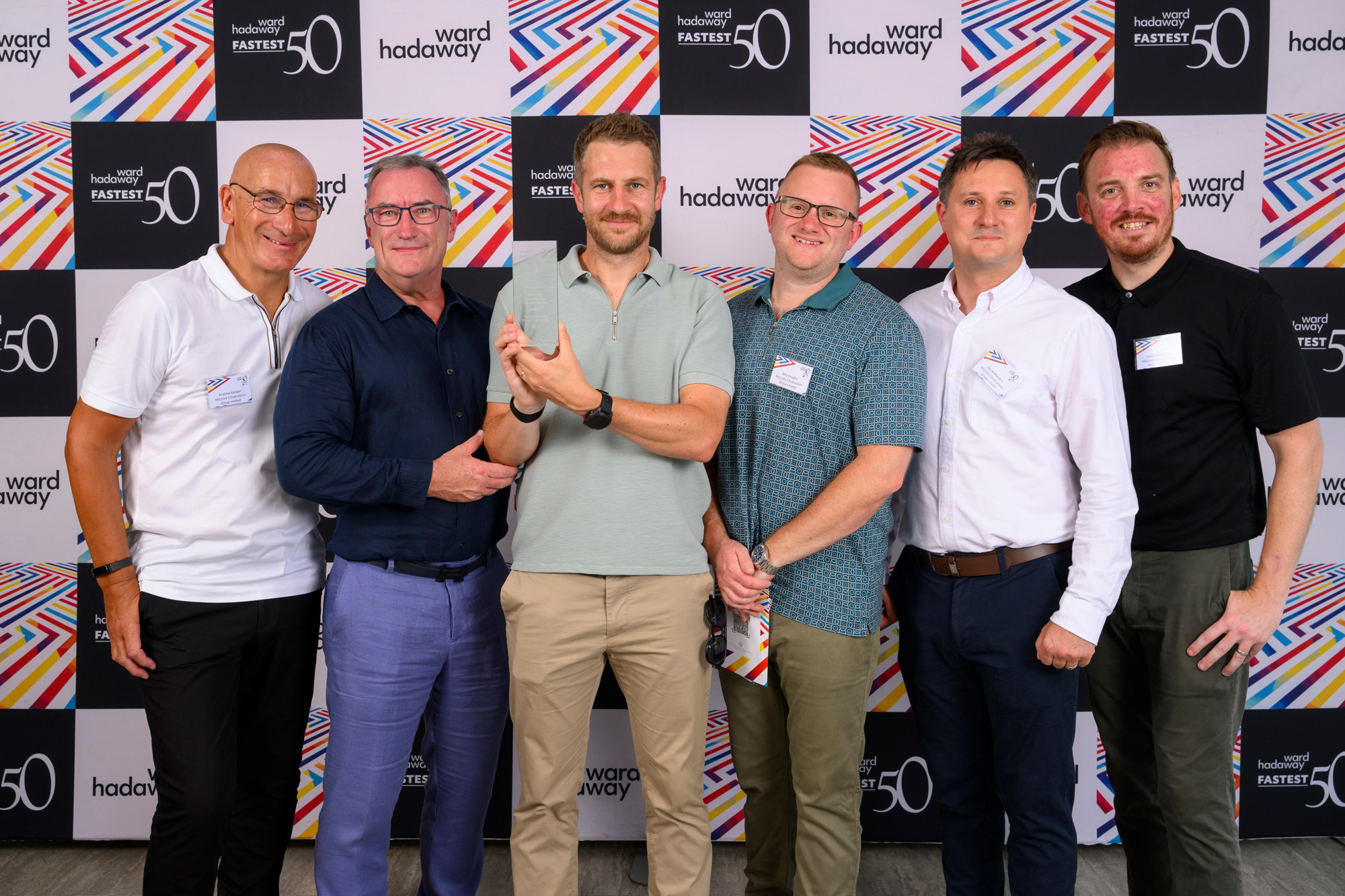 McCrory Construction team posing with their Fastest 50 award